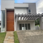 3 dormitórios 3 suítes 5 banheiros 2 vagas 361.61m² privativo 193.7m² construído CASA CONDOMÍNIO BUENAVISTA Excelente residência, projeto moderno com ampla área envidraçada, orientação solar privilegiada, 193 m² de área construída em terreno elevado com linda vista para o pôr do sol. O pavimento térreo conta com hall de entrada, lavabo, ampla sala de estar com lareira, sala de jantar, pé direito duplo, cozinha integrada, lavanderia e banheiro auxiliar. Completam o térreo um grande pátio gramado. No segundo pavimento há três confortáveis suítes, sendo a do casal com amplo banheiro e closet. O Buenavista Condomínio Parque é um condomínio fechado de terrenos, possui infraestrutura completa e conceito de clube, suas unidades contam com áreas privativas a partir de 330 m². Com projeto realizado em 2008 pela incorporadora Maiojama em parceria com o escritório de arquitetura Mário Quintana, está localizado em uma área com mais de 700 mil m². Cercado pela natureza, mais de 220 mil m² são áreas de mata nativa preservada, possibilitando a integração perfeita entre moradia e o convívio junto a natureza. Seu conceito de clube possui uma estrutura completa: - Academia - Academia ao ar livre - Cachorródromo - Cafeteria para moradores e visitantes - Cancha de bocha - Espaço kids / Brinquedoteca - Estacionamento para visitantes - Máquina de água quente - Máquina de gelo - Mata nativa - Mercado para moradores e visitantes - Piscinas adulto e infantil - Pista de patins - Pista de skate - Bowl e Street - Playground - Portaria de serviço - Portaria Social - Quadra de areia - Quadra de futebol gramado - Quadra de tênis - Quadra poliesportiva - Quiosques com churrasqueira - Restaurante para moradores e visitantes - Salão de beleza para moradores e visitantes - Salão de festas clube para 100 pessoas - Salão de festas externo para 50 pessoas - Salão gourmet para 25 pessoas - Trilha ecológia - Vestiário e banheiros Visite este imóvel, plantão no condomínio. Jaqueline Santos (51) 99503.4438 Corretora de Imóveis Creci 75.328F